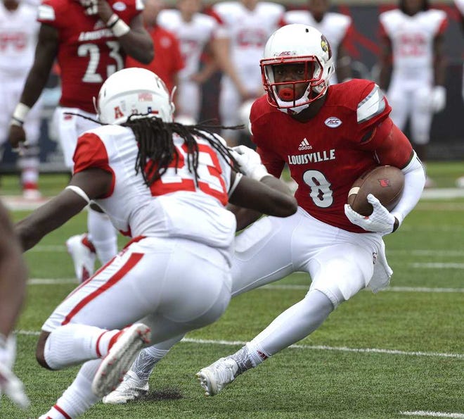 Timothy D. Easley Associated Press Louisville quarterback Lamar Jackson (8) is fighting for the starting job with Kyle Bolin.