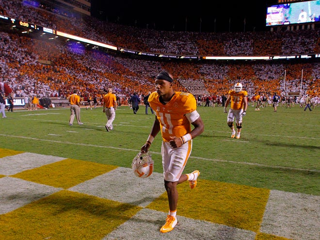 Tennessee quarterback Joshua Dobbs (11) leaves the field after a 31-24 loss to Oklahoma in double overtime of an NCAA college football game Saturday, Sept. 12, 2015 in Knoxville, Tenn.