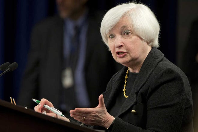 Federal Reserve Chair Janet Yellen gestures as she answers a question during a news conference in Washington, Thursday, Sept. 17, 2015. The Federal Reserve is keeping U.S. interest rates at record lows in the face of threats from a weak global economy, persistently low inflation, and unstable financial markets. (AP Photo/Jacquelyn Martin)