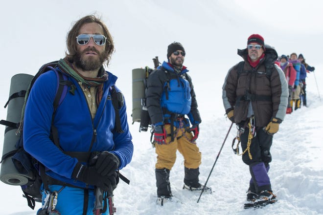 Jake Gyllenhaal, from left, as Scott Fischer, Michael Kelly as Jon Krakauer, and Josh Brolin as Beck Weathers, in the film “Everest.” UNIVERSAL PICTURES