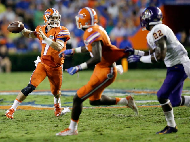 Florida quarterback Will Grier (7) looks for a receiver against East Carolina during the first half of an NCAA college football game, Saturday, Sept. 12, 2015, in Gainesville.