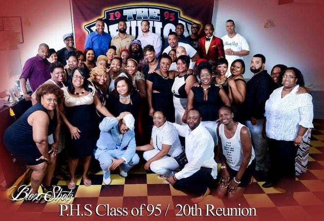 Members of the Petersburg High School class of 1995 pose for a group photo during their 20th year reunion dinner and dance. Photo courtesy of Brock Maurice Photography