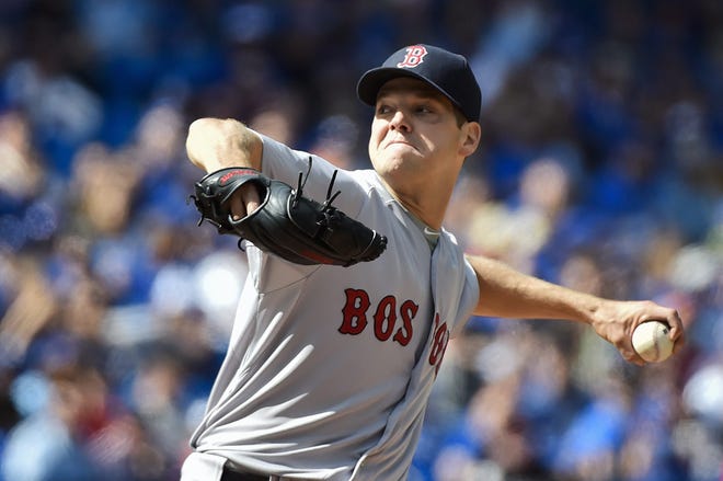 Red Sox starter Rich Hill works against the Blue Jays in Toronto. The Associated Press