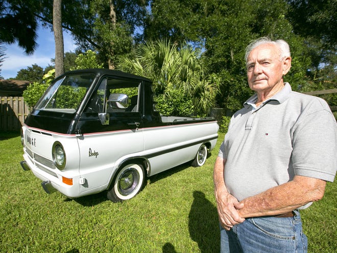 Gary Llewellyn is shown with his restored and modified 1965 Dodge A100 van/pickup at his home in Ocala on Sept. 15.