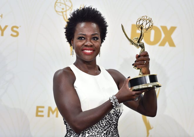 Viola Davis poses in the press room with the award for outstanding lead actress in a drama series for “How to Get Away With Murder” at the 67th Primetime Emmy Awards on Sunday, Sept. 20, 2015, at the Microsoft Theater in Los Angeles.