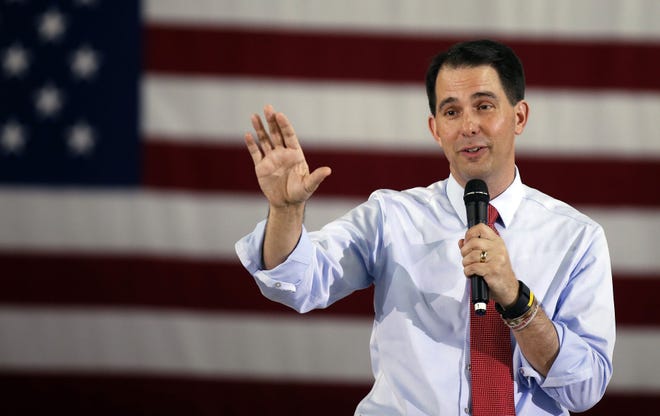 In this Sept. 14 photo, Republican presidential candidate Wisconsin Gov. Scott Walker speaks in Las Vegas. Two people familiar with his decision say Walker is dropping out of the Republican race for president. AP PHOTO