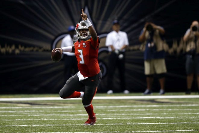 Tampa Bay Buccaneers quarterback Jameis Winston (3) scrambles in the second half of an NFL football game against the New Orleans Saints in New Orleans, Sunday, Sept. 20, 2015. (AP Photo/Jonathan Bachman)