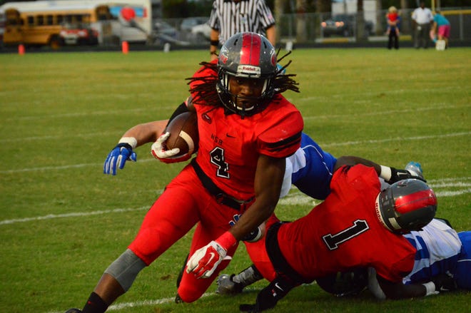 New Smyrna Beach's Darrynton Evans turns the corner against Deltona. Evans has a handful of college offers, and he has started planning his visits. News-Journal/BRIAN LINDER