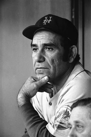File-This Sept. 21, 1973, file photo shows Yogi Berra, manager of the New York Mets, watching his team work during a game in Philadelphia. Berra, the Yankees Hall of Fame catcher has died. He was 90. -AP Photo/Ray Stubblebine, File