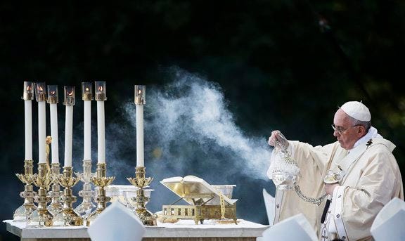Pope Francis conducts Mass outside the Basilica of the National Shrine of the Immaculate Conception Wednesday, Sept. 23, in Washington. AP