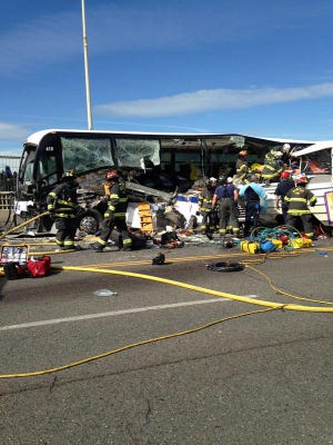 A "duck boat" tour vehicle and a charter bus carrying foreign college students collided on a busy Seattle bridge Thursday, killing four people and sending dozens to hospitals Photo Credit: Seattle Fire Department