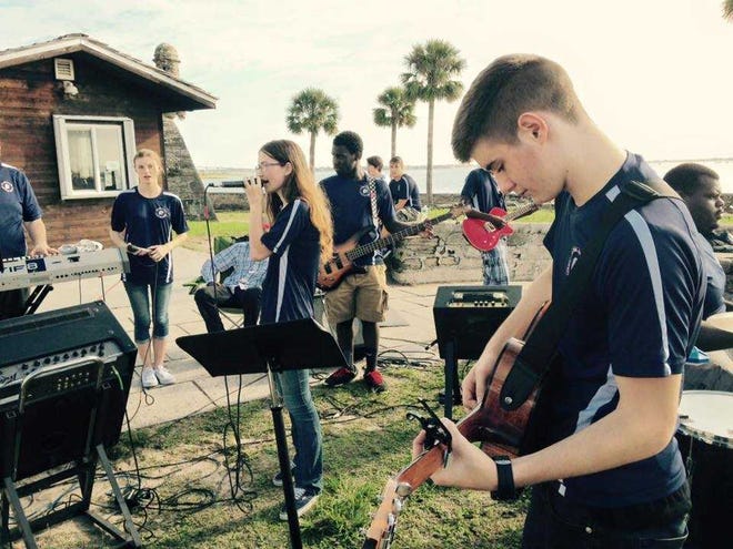 The Beacon Band leads worship at the 9/11 Prayer and Remembrance gathering at the Castillo de San Marcos Sept. 11.