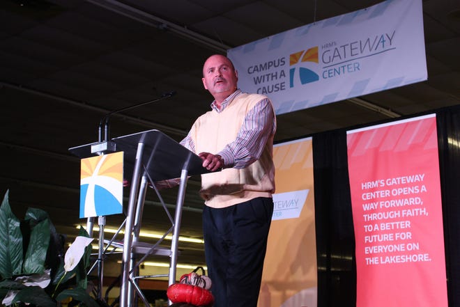 Darryl Bartlett, Holland Rescue Mission executive director, speaks to a crowd during a annual event on Thursday, Sept. 24, as he announces a $7.5 million campaign to renovate an former Menards store into its new main hub, called the Gateway Center. Justine McGuire/Sentinel staff