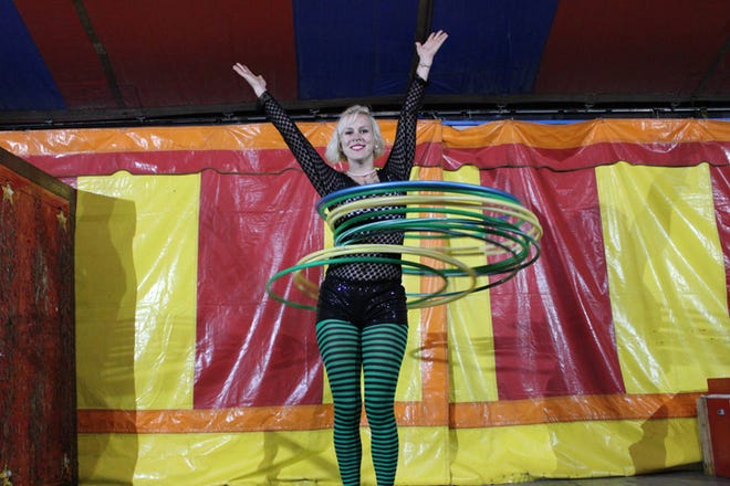 The World of Wonders show is free with admission to the fair. One of the 10 acts included is a hula hoop champion.