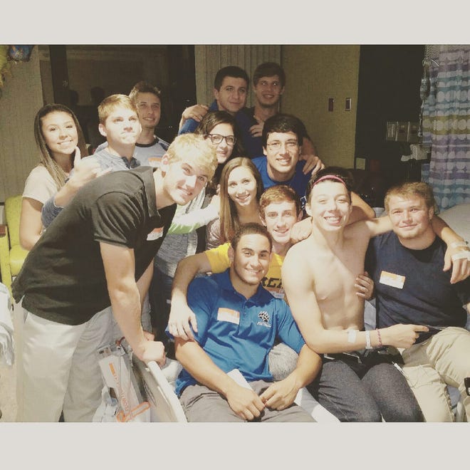 Pleasant Valley senior Brody Keefe, second from right, is surrounded by friends during a recent visit at Lehigh Valley Cedar Crest Hospital in Allentown. Keefe was diagnosed with leukemia, but is due to be released in early October. (photo provided)