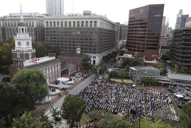A crowd gathers outside Independence Hall in Philadelphia on Saturday to hear Pope Francis speak. Elizabeth Robertson/The Philadelphia Inquirer, via AP, Pool