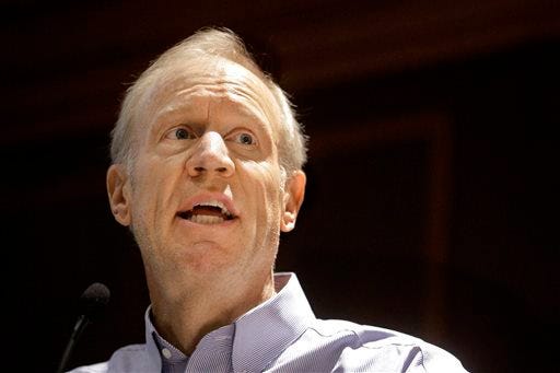 Illinois Gov. Bruce Rauner speaks to members of the Illinois Emergency Management Agency in September in Springfield. (AP Photo/Seth Perlman)