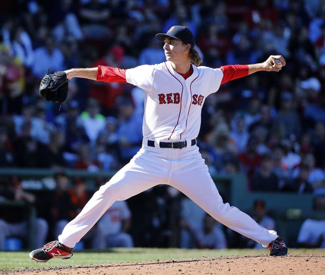 Red Sox pitcher Henry Owens delivers to the plate during Boston's 2-0 win over the Orioles on Sunday.