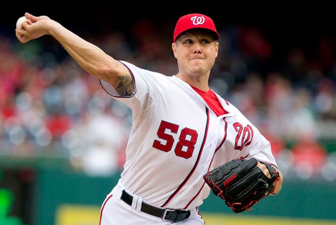 Washington Nationals relief pitcher Jonathan Papelbon delivers during the eighth inning of a baseball game against the Philadelphia Phillies at Nationals Park on Sunday, Sept. 27, 2015, in Washington. Papelbon got into a dugout fight with teammate Bryce Harper during the inning. The Phillies won 12-5. (AP Photo/Jacquelyn Martin)
