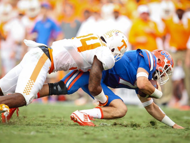 Florida Gators quarterback Will Grier (7) is sacked by Tennessee Volunteers linebacker Quart'e Sapp (14) during the second half of the Gators' come from behind win against the Tennessee Volunteers on Saturday, September 26, 2015 at Ben Hill Griffin Stadium in Gainesville, Fla. Rob C. Witzel / Staff photographer
