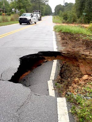 Monday's rain washed away part of Bob Sikes Road near Henderson Drive in Walton County.