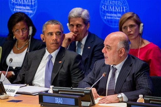 President Barack Obama, accompanied by, rear, from left, National Security Adviser Susan Rice, Secretary of State John Kerry, and U.S. Ambassador to the United Nations Samantha Power, right, listens as Iraqi Prime Minister Haider al-Abadi, second from right, speaks at the Leadersí Summit on Countering ISIL and Countering Violent Extremism, Tuesday, Sept. 29, 2015, at the United Nations headquarters. (AP Photo/Andrew Harnik)