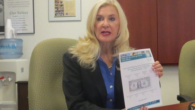 Palm Beach County Clerk and Comptroller Sharon Bock briefs reporters on Sept. 29, 2015, on her plan to continue cuts in services and hours as a result of what Bock calls unfair distribution of state money to clerks. (Eliot Kleinberg / The Palm Beach Post)