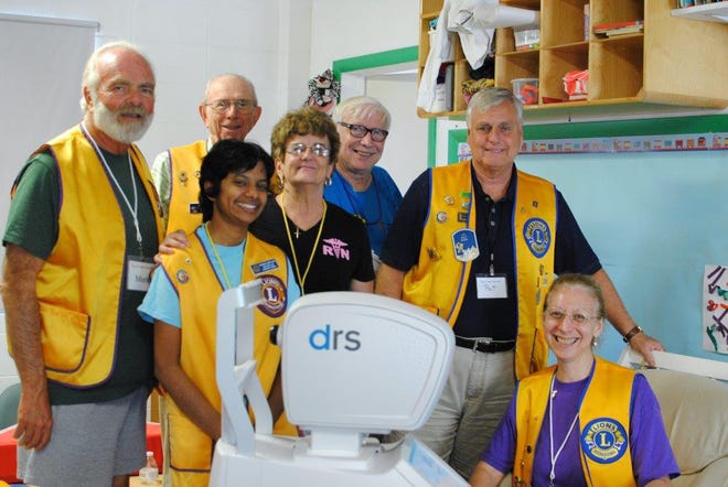 From left, Mark Ambrosia, Roy Cowen, Anu Bajali, Margaret Alletson, Hank Lunsford, Patrick Block, Janet Nagouneny duringt the Sarasota Lions Club free screening day at Trinity Methodist Church. PHOTO PROVIDED BY HANK LUNSFORD