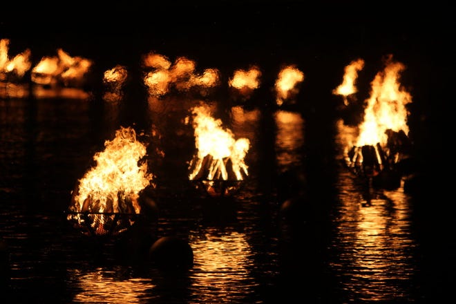 Saturday's full WaterFire lighting begins shortly after sunset. Activites include an Afro-Brazilian martial art performance by Grupo Ondas and events associated with the Gloria Gemma Breast Cancer Research Foundation's Flames of Hope: A Celebration of Life weekend. Providence Journal File Photo