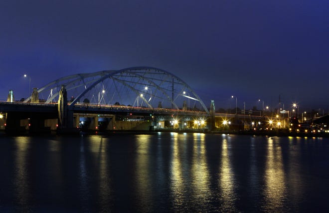 The Iway bridge illuminated under a night sky recently. The span was designed to be an aesthetic gateway landmark for Rhode Island's capital city. The Providence Journal / Kris Craig