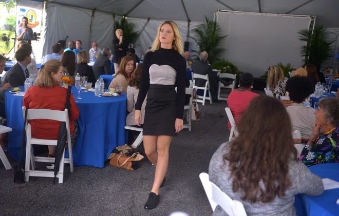 Photos by Steve Bisson/Savannah Morning News A fashion show emceed by stylist Ashley Borders took place at the Goodwill of the Coastal Empire on Sallie Mood Drive to celebrate the organization's 50th anniversary.