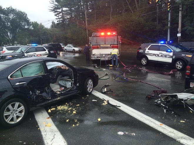 At least two people were injured following a two-car crash on Route 138 in Raynham Friday morning, Oct. 2, 2015.