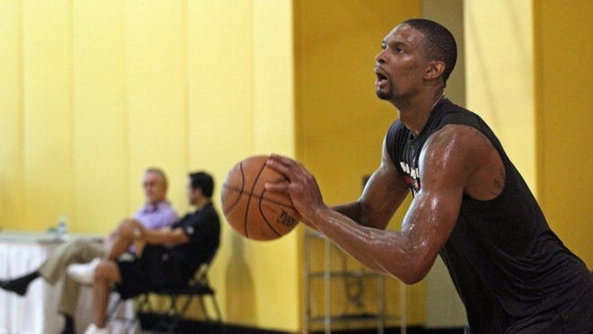 The Heat will depend on Chris Bosh to continue to improve his 3-point shooting this season. (C.M. Guerrero/El Nuevo Herald)