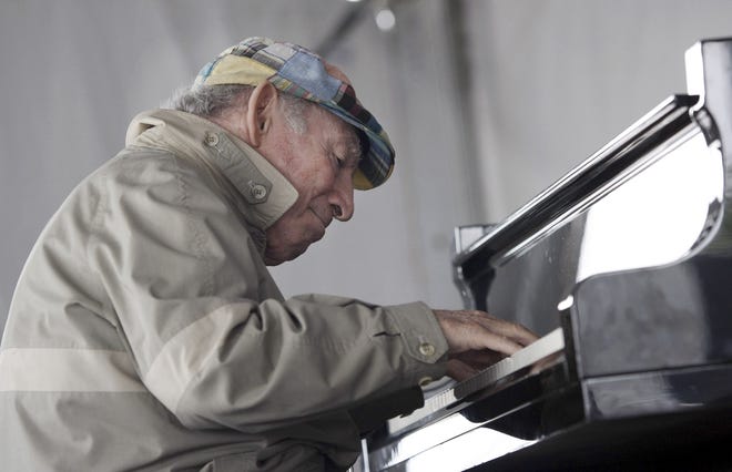 In this 2009 file photo, Newport Jazz Festival founder George Wein performs during a session with Christian McBride at the festival in Newport, R.I. The Associated Press