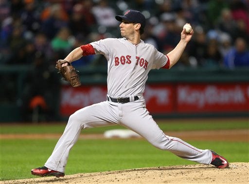 Red Sox starer Craig Breslow delivers a pitch against the Indians on Saturday night. THE ASSOCIATED PRESS