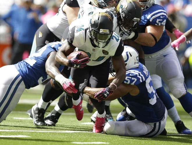 Michael Conroy Associated Press The Jaguars' T.J. Yeldon runs during the first half against the Colts on Sunday. Yeldon finished with 105 rushing yards.