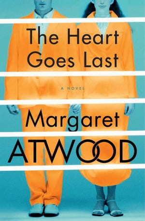 This cover image released by Nan A. Talese/Doubleday shows "The Heart Goes Last," by Margaret Atwood. (Nan A. Talese/Doubleday via AP)