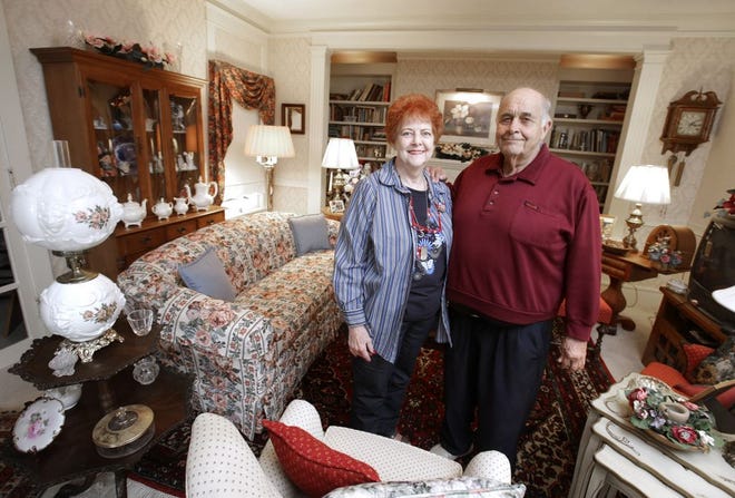 Mary Cirelli and her former husband, Sam, are shown inside Mary Cirelli's home on 19th Street NW.
