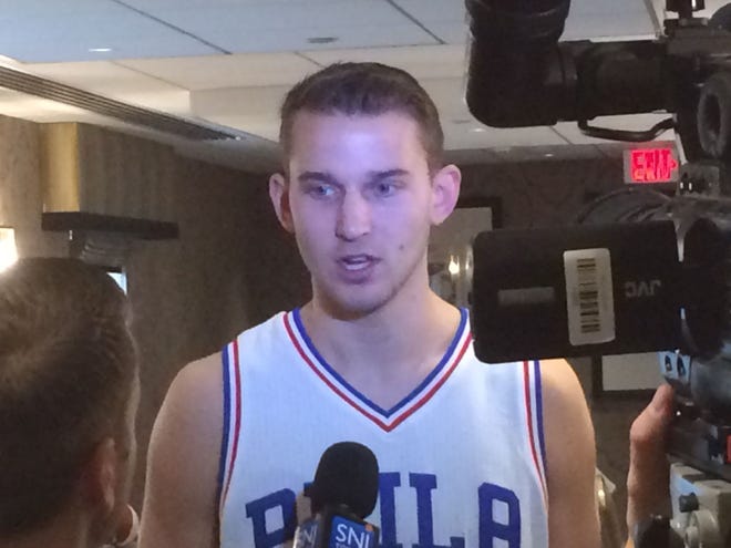 New Sixers shooting guard Nik Stauskas does an interview at training camp.