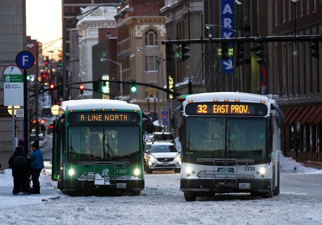 RIPTA buses enter Kennedy Plaza last January. The agency is considering doing away with a free-ride program. The Providence Journal/Glenn Osmundson