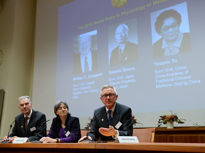 Jan Andersson, Juleen Zierath and Hans Forssberg, members of the Karolinska Institute Nobel committee, talk to media at a press conference in Stockholm, Monday Oct. 5, 2015. The Nobel judges awarded the prize to Irish-born William Campbell, Satoshi Omura of Japan and Tu Youyou of China, the first ever medicine laureate from China.