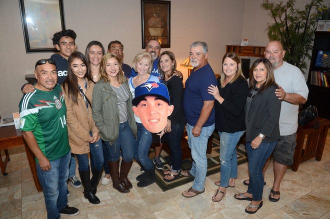 Aaron Sanchez's mother Lynn Shipley holds a cutout head of her son, who plays for the Toronto Blue Jays. (David Pardo, Daily Press)