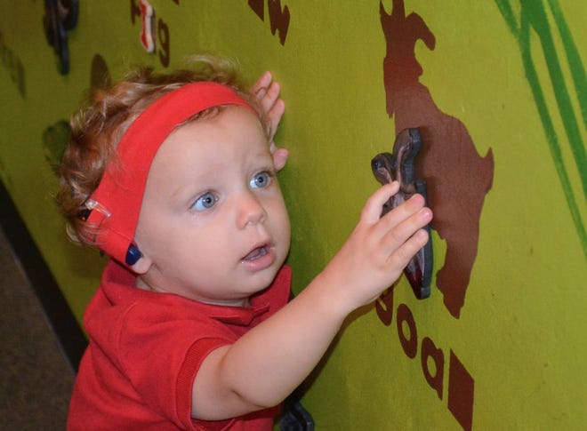 Anthony Cammarata, 13 months, from Feasterville plays with magnetic animals at the Bucks County Children's Museum on Sept. 27, 2015.