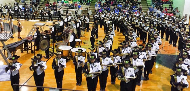 Courtesy of Christy Sherman The RHHS Marching Wildcats perform their halftime show indoors at the Bulldog Invitational in Thomsons last weekend.