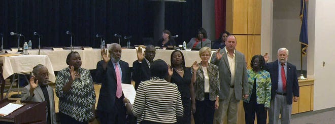 Jessicah Lawrence/Jasper County Sun Times All nine Jasper County School Board members elected on Sept. 22 were sworn into office at the Sept. 28 board meeting.
