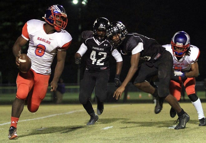 West Craven's Darius Abrams runs against Havelock last season. Abrams is West Craven's starting quarterback and has combined for 14 touchdowns running and throwing this season.