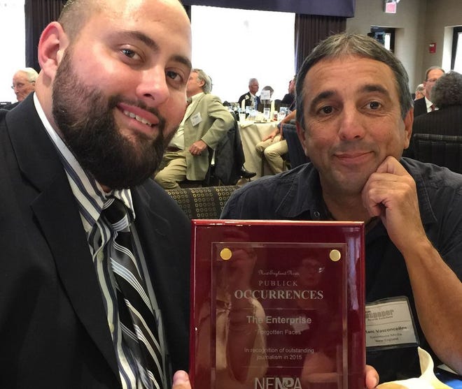 Enterprise reporter Ben Paulin, left, and photographer Marc Vasconcellos attend the New England Newspaper awards luncheon Thursday at Crowne Plaza in Natick where they received the Publick Occurrences Award for excellent journalism.