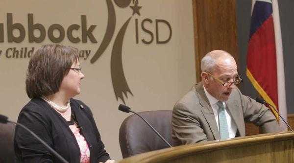 Lubbock ISD Board of Trustees representative Laura Vinson listens to board president Dan Pope during a meeting in 2014.