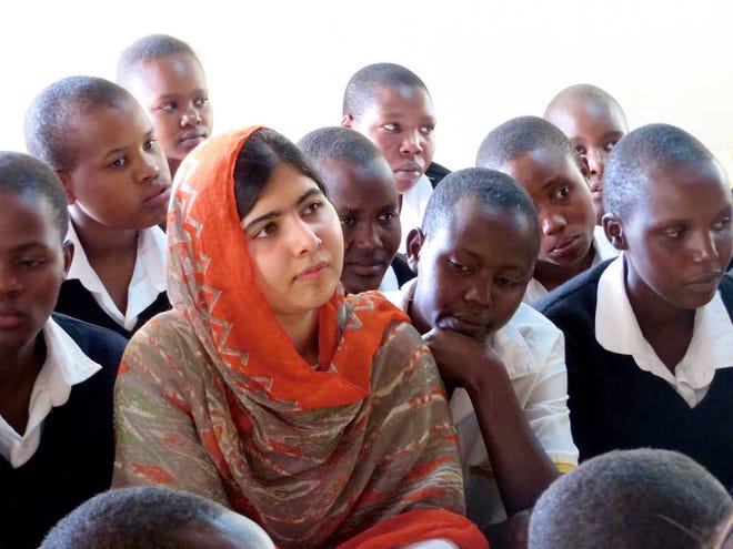 Malala Yousafzai, second left, at the Kisaruni Girls School in Massai Mara, Kenya. Yousafzai is the subject of the documentary film "He Named Me Malala."