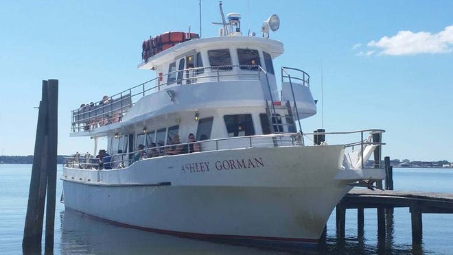 Passengers prepare to set sail Wednesday on the Ashley Gorman.